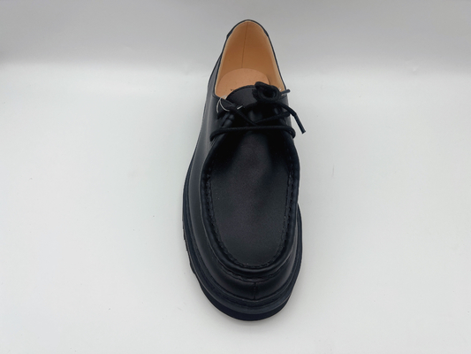 Los zapatos planos negros de encargo para mujer impermeabilizan no los zapatos de trabajo del resbalón