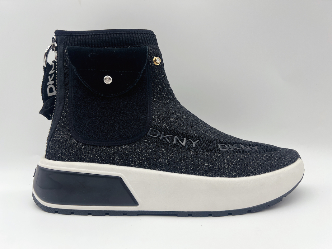 Los zapatos de trabajo resistentes del alto resbalón superior negro de las señoras suavemente hacen punto la tela con doblado